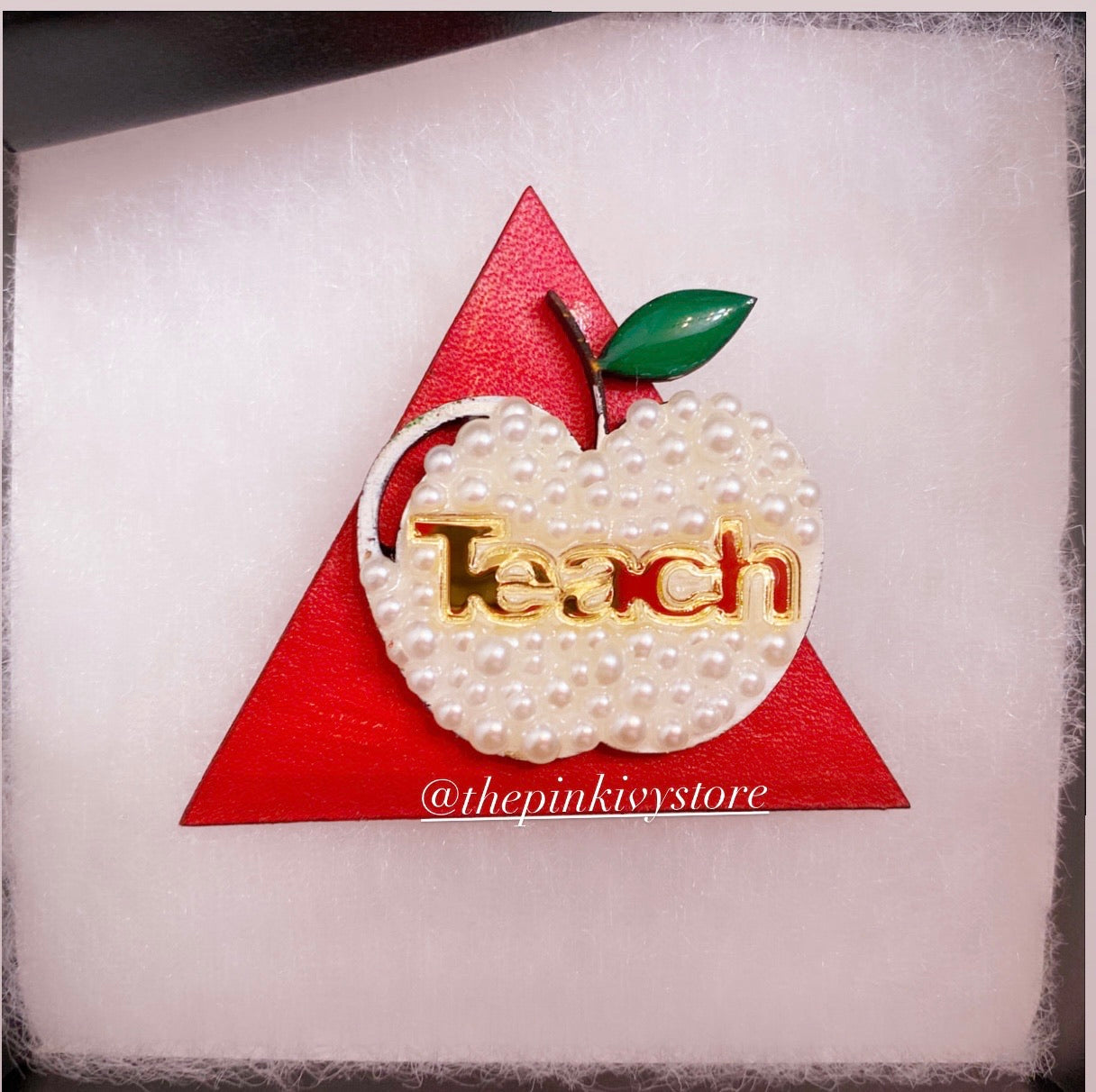 Crimson and cream TEACH lapel pin