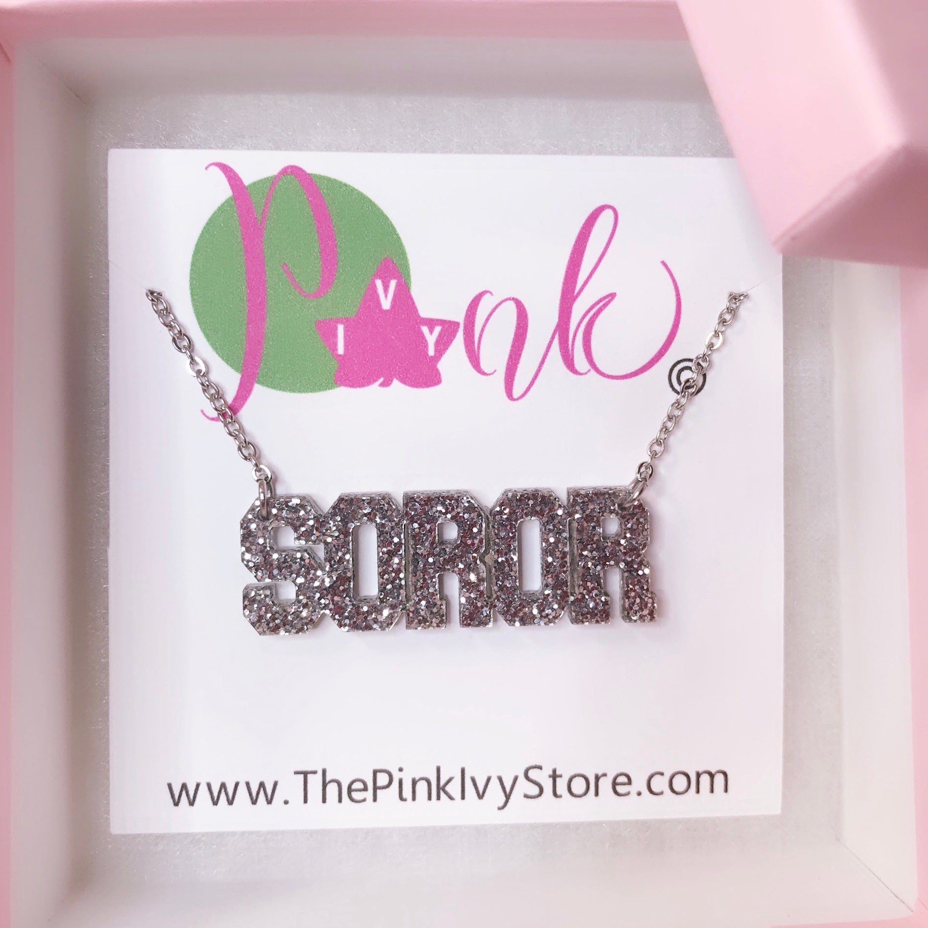Silver glitter Soror necklace by The Chic Greek.