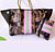 Pink and green AKA striped camouflaged tote bag with pouch included.
