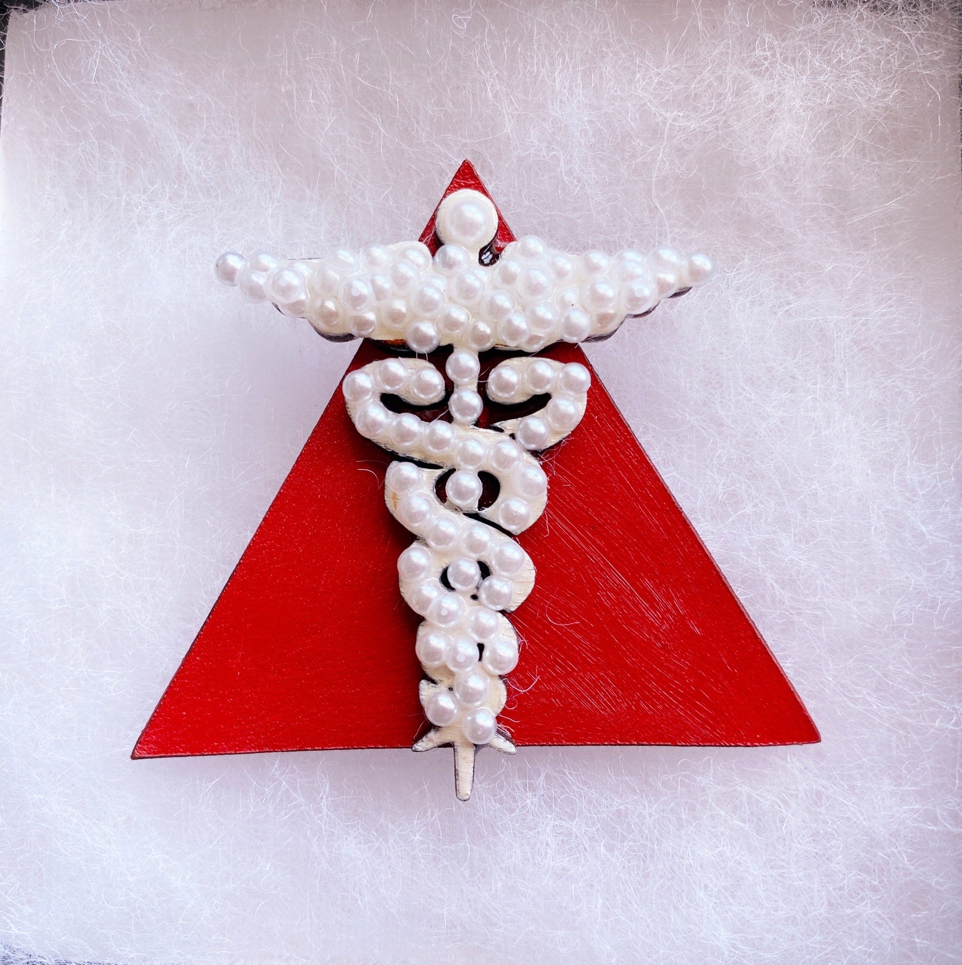 Red and pearl Caduceus medical brooch for healthcare professionals - crimson and cream Delta Sigma Theta sorors.